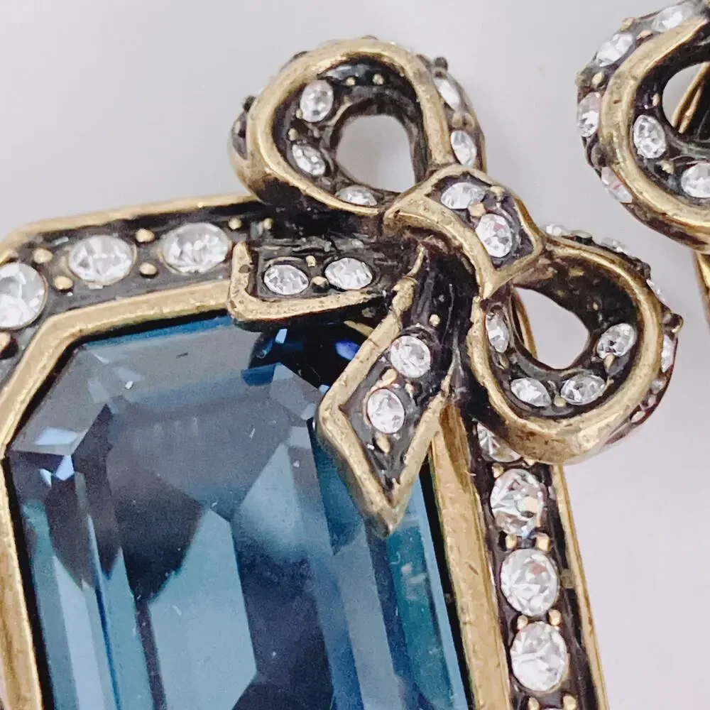 Vintage Signed Heidi Daus Blue Glass Bow Clip On Earrings Rhinestone Collectible